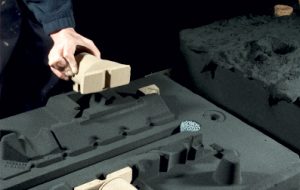 Sand moulding